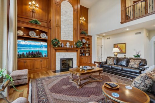 Danbury great room fireplace with built-in wood cabinetry