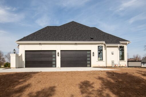 Settlers Circle garage wing with modern garage doors