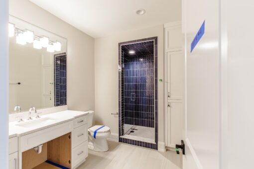 Settlers Circle bathroom with navy tile shower