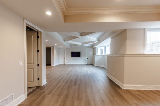 Settlers Circle lower-level family room with coffered ceiling