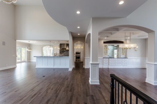 Settlers Circle great room view to the kitchen through columns