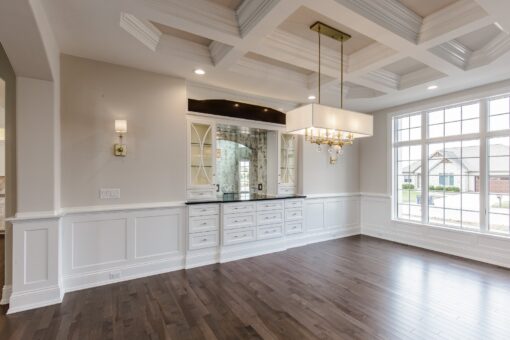 Settlers Circle dining room with coffered ceiling and built-in buffet