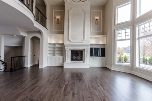 Settlers Circle two-story great room with fireplace and built-ins