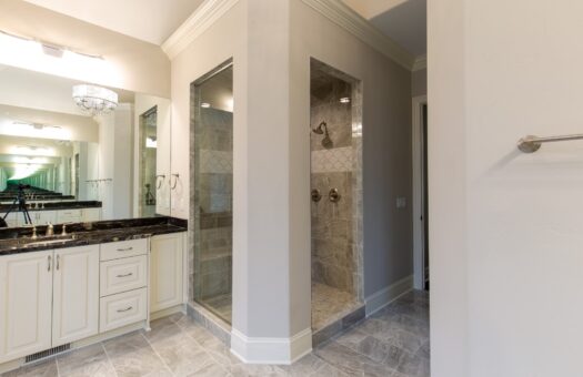 Woodview primary bath vanity and shower entry