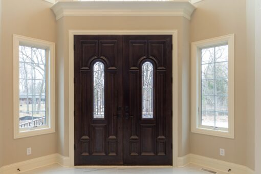 Woodview dark wood double entry doors with glass inserts