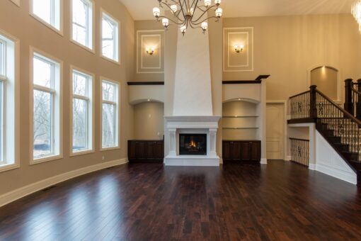 Woodview two-story great room with fireplace and window wall