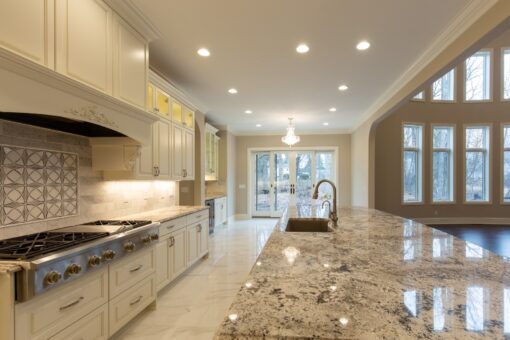 Woodview kitchen with granite island and professional range