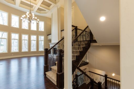 Woodview foyer staircase and two-story windows
