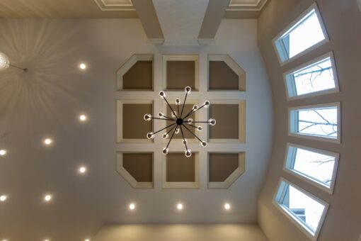 Woodview coffered ceiling with iron chandelier