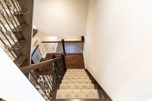 Woodview stair landing with carpet runner