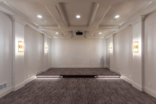 Carlisle lower-level home theater with stage platform