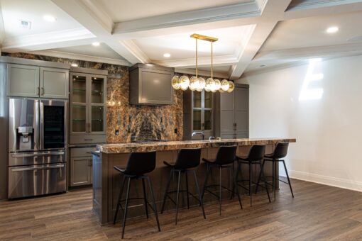 Carlisle lower-level bar with granite counter and stools