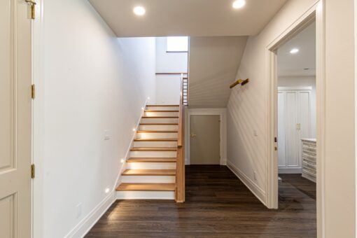 Carlisle floating wood staircase to the lower level