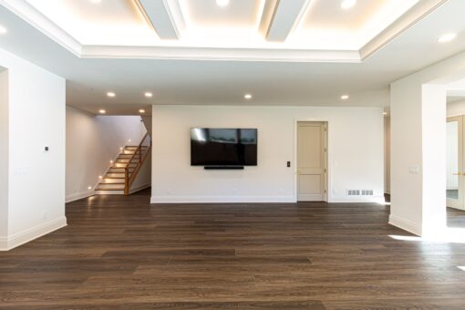Carlisle lower level with staircase and media wall