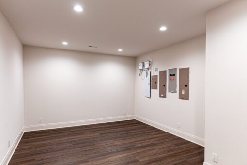 Carlisle lower-level room with wall art