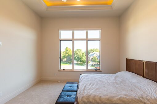Carlisle bedroom with window and bench