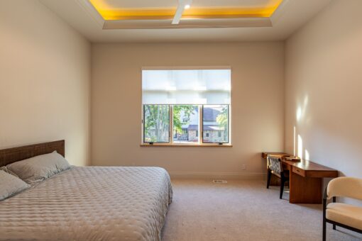 Carlisle bedroom with lit tray ceiling