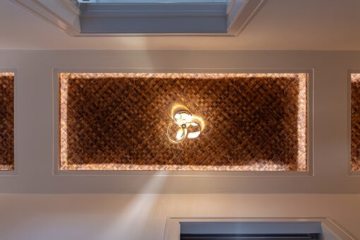 Carlisle ceiling with woven wood panel and pendant