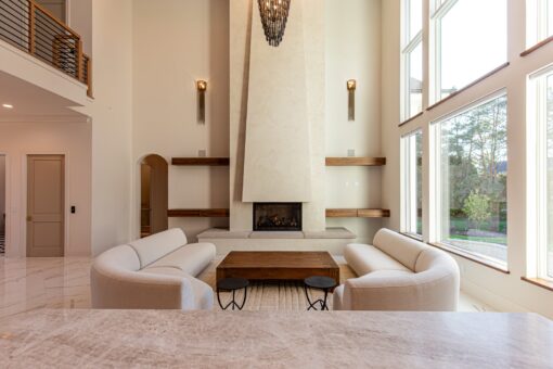 Carlisle great room with plaster fireplace and sectional