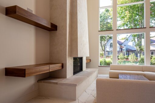 Carlisle great room fireplace with walnut shelves