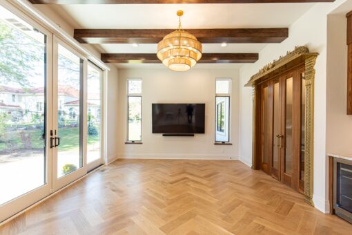 Carlisle hearth room with timber beams and herringbone floor