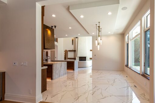 Carlisle kitchen with pendant lights and open living area