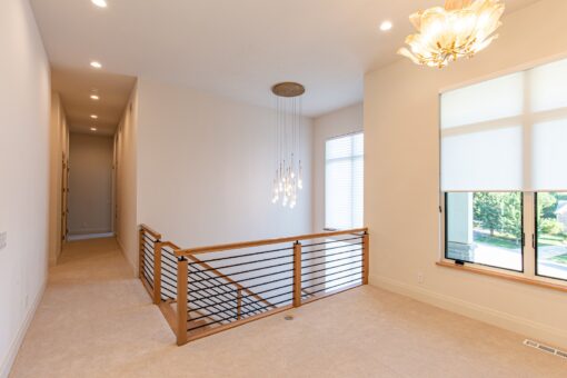 Carlisle loft with pendant light and railing
