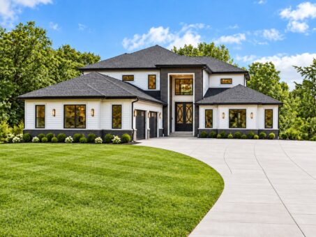Apex custom home exterior in Sussex by Kingfogl Construction