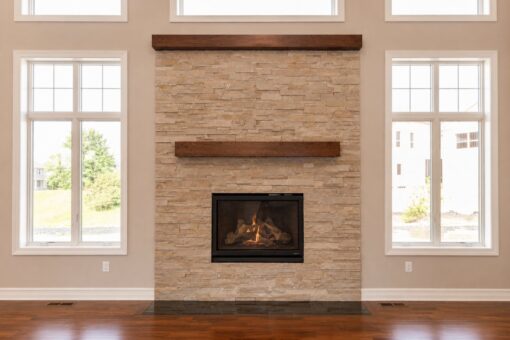 Auburn custom home in Brookfield by Kingfogl – 1st floor - great room - fireplace lit