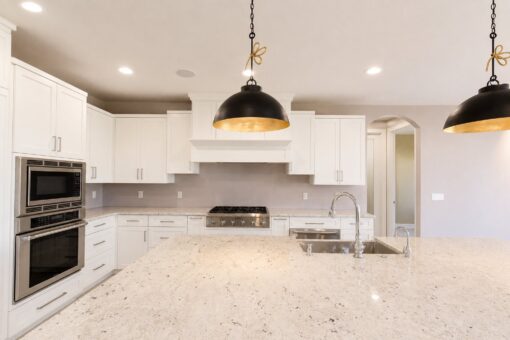 Auburn custom home in Brookfield by Kingfogl – 1st floor - kitchen - range wall
