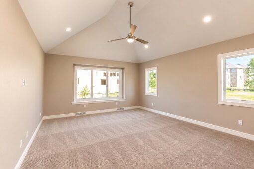 Auburn custom home in Brookfield by Kingfogl – 1st floor - primary bedroom - view 1