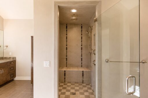 Auburn custom home in Brookfield by Kingfogl – 1st floor - primary bath - shower - view 2