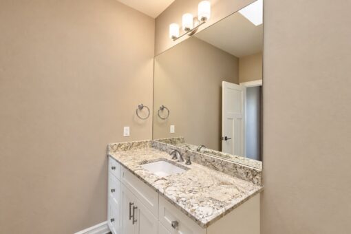 Auburn custom home in Brookfield by Kingfogl – 2nd floor - bath - beige - vanity