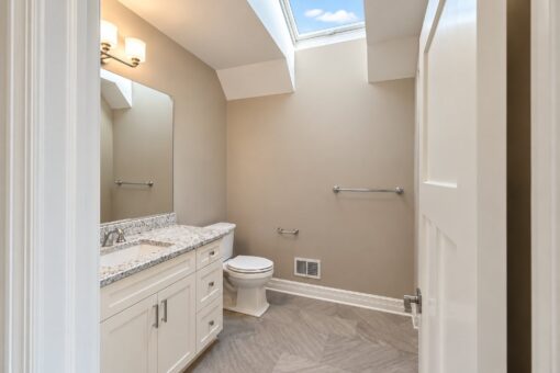 Auburn custom home in Brookfield by Kingfogl – 2nd floor - hall bath - skylight