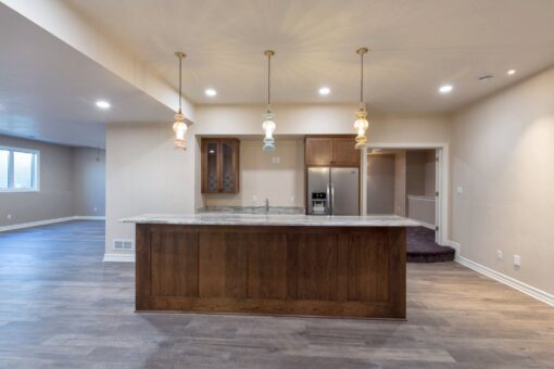 Auburn custom home in Brookfield by Kingfogl – basement - bar - view 2