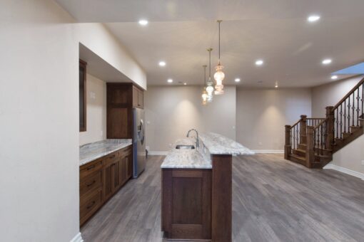 Auburn custom home in Brookfield by Kingfogl – basement - bar - view 3