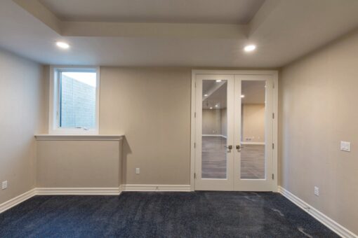 Auburn custom home in Brookfield by Kingfogl – basement - bedroom - view 2