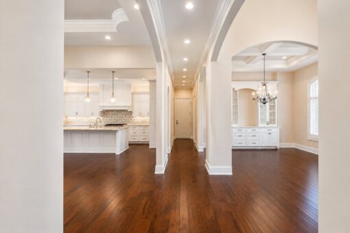 Bella Casa custom home in Mequon by Kingfogl – great room to kitchen