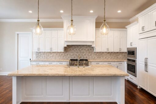Bella Casa custom home in Mequon by Kingfogl – kitchen island view 3