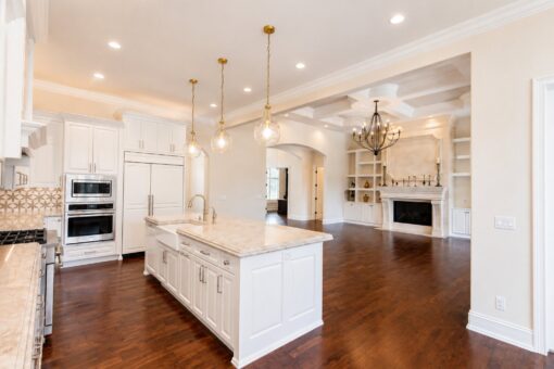 Bella Casa custom home in Mequon by Kingfogl – kitchen island view 4