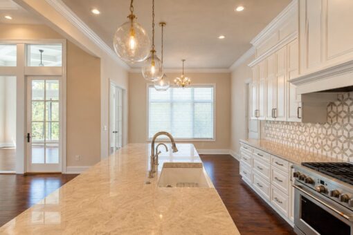 Bella Casa custom home in Mequon by Kingfogl – kitchen range wall