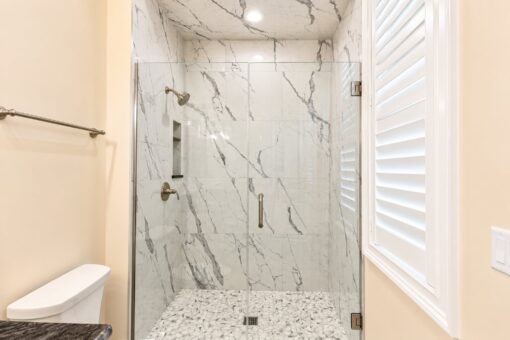 Bella Casa custom home in Mequon by Kingfogl – guest bath 2 shower