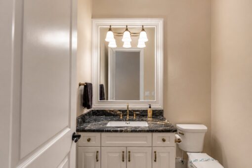 Bella Casa custom home in Mequon by Kingfogl – powder room