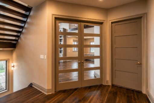 Compton custom home in Brookfield by Kingfogl – 1st floor - library - french doors