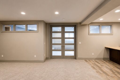 Compton custom home in Brookfield by Kingfogl – basement - french doors