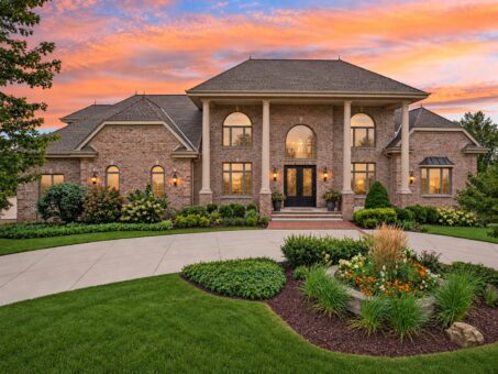 Danbury custom home in Brookfield by Kingfogl – front elevation at sunset