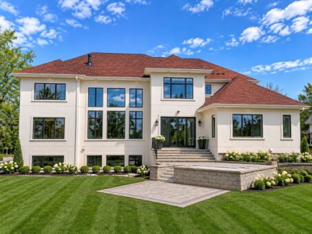 Davidson custom home in Brookfield by Kingfogl – rear elevation with stone steps and patio