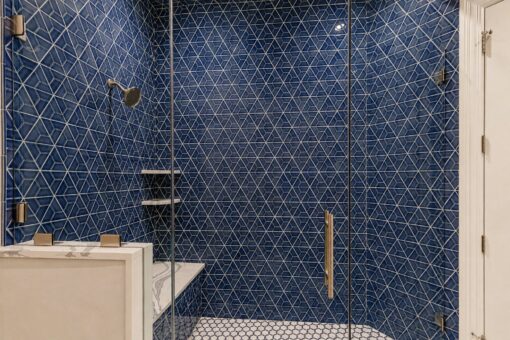 Gatsby custom home in Oconomowoc by Kingfogl – 2nd floor - blue tile shower