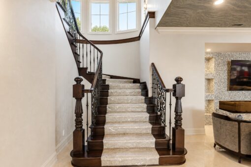 Gatsby custom home in Oconomowoc by Kingfogl – basement - staircase