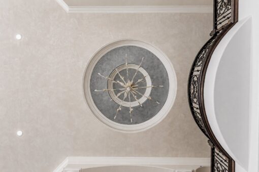 Gatsby custom home in Oconomowoc by Kingfogl – ceiling - medallion by staircase
